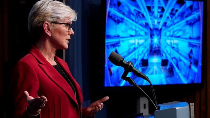US Secretary of Energy Jennifer Granholm announces a major scientific breakthrough in fusion research that was made at the Lawrence Livermore National Laboratory in California, during a news conference at the Department of Energy in Washington on Tuesday (US time). Photo / AP