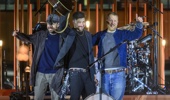 Ben Lovett, Marcus Mumford and Ted Dwane of British folk-rock band Mumford and Sons perform at the Apple 50th Anniversary Event held at Battersea Power Station in London, United Kingdom on March 25, 2026. (Photo by Stringer/Anadolu via Getty Images)