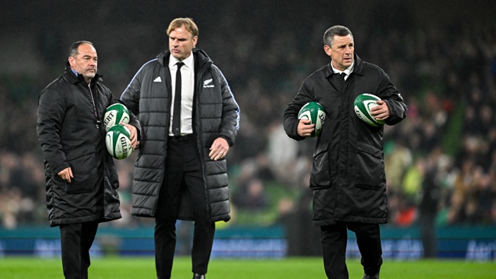 New Zealand assistant coach - attack - Jason Holland, right, alongside assistant coach - defence - Scott Hansen, left, and head coach Scott Robertson during the Autumn Nations Series match between Ireland and New Zealand at the Aviva Stadium in Dublin. (Photo By Sam Barnes/Sportsfile via Getty Images)