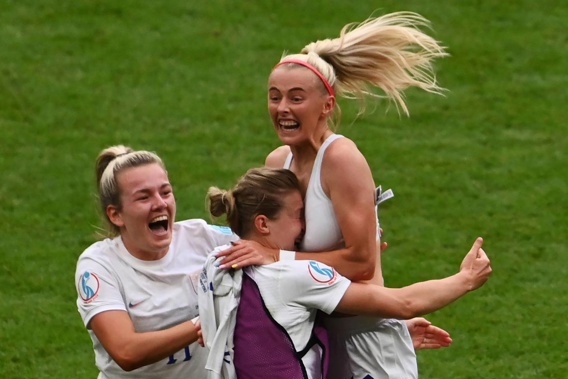 England's Chloe Kelly, right, celebrates with teammates after scoring her side's second goal during the Women's Euro 2022 final match againt Germany at Wembley Stadium. Photo / AP