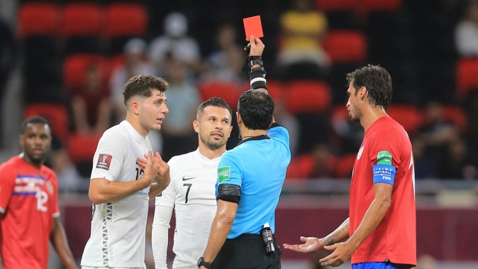 New Zealand's Kosta Barbarouses, centr,e gets a red card during the World Cup 2022 qualifying play-off. Photo / AP