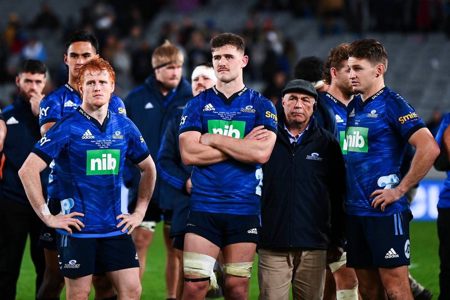 Blues players look on in disappointment after the 2022 Super Rugby Pacific Final loss against the Crusaders at Eden Park. Photo / Photosport