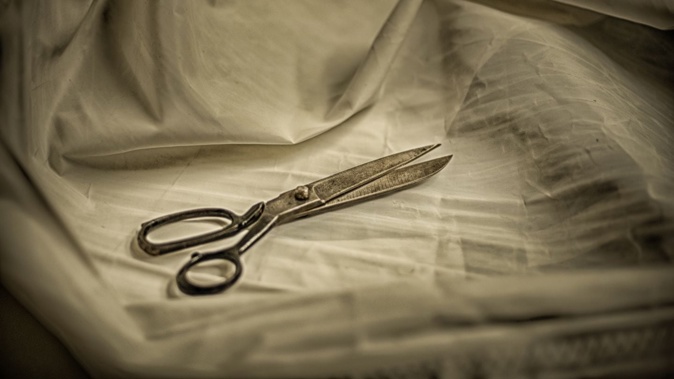 A woman is on trial after stabbing her husband during sex with a pair of scissors. Photo / Getty Images