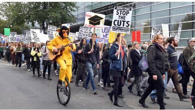 A noisy and passionate group of about 400 protesters marched through the University of Otago campus during a protest against cuts at the financially troubled institution. Photo / Otago Daily Times