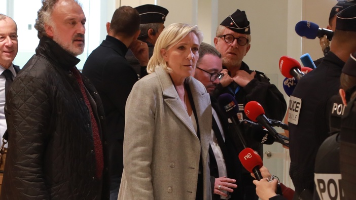 Leader of France's far-right National Rally (RN) Marine Le Pen alongside senior party officials, arrives at a court house for a trial facing allegations of embezzling European Parliament funds through fake jobs in Paris, France on September 30, 2024. (Photo by Mohamad Alsayed/Anadolu via Getty Images)