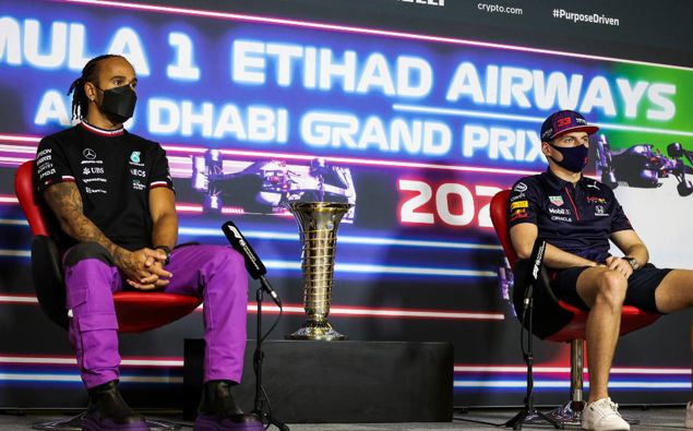 Lewis Hamilton (L) and Max Verstappen (R) speak during a press conference ahead of the Abu Dhabi Grand Prix. (Photo / AP)