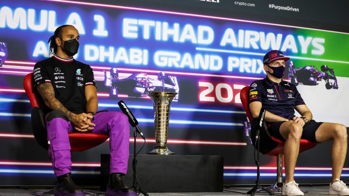 Lewis Hamilton (L) and Max Verstappen (R) speak during a press conference ahead of the Abu Dhabi Grand Prix. (Photo / AP)