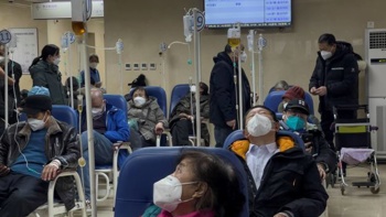 Beds run out at Beijing hospital as Covid surge continues 