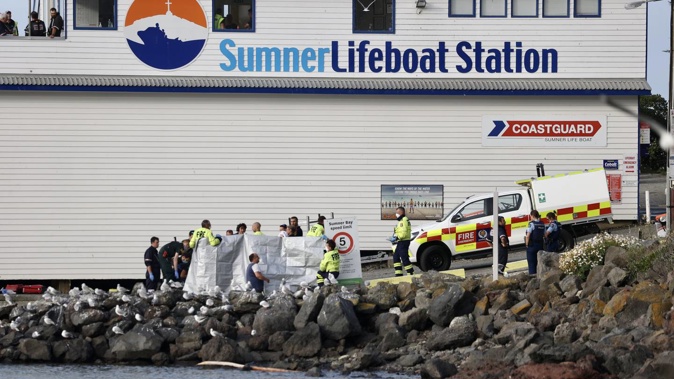 Emergency services attending to the incident in New Brighton, Christchurch. Photo / George Heard