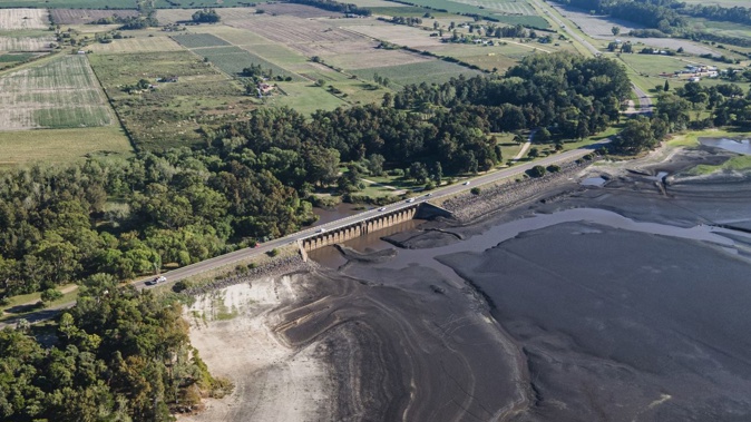 Low water levels at the Canelón Grande reservoir on March 13, 2023. Ernesto Ryan/Getty Images