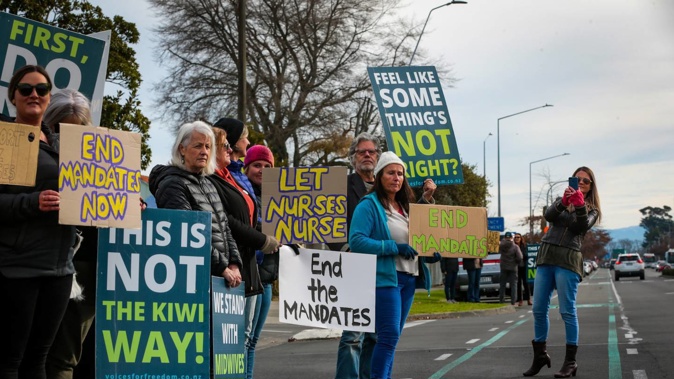 Former health workers gathered outside the Hawke's Bay District Health Board earlier this year to protest the vaccine mandate. Photo / Paul Taylor