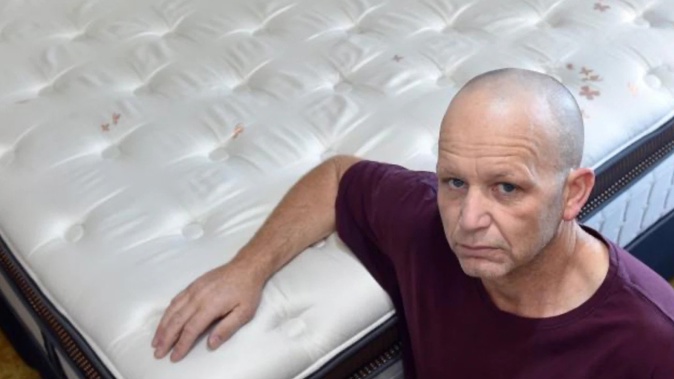 Dunedin resident Nathan Richardson was hoping to sell the queen-sized bed he bought in 2019 so he could afford Christmas. Photo / Peter McIntosh