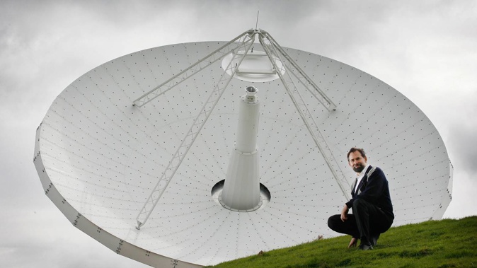 Professor Sergei Gulyaev, director of AUT's Institute of Radio Astronomy and Space Research, pictured with the Warkworth observatory's 30m radio telescope in 2008. Photo / Greg Bowker