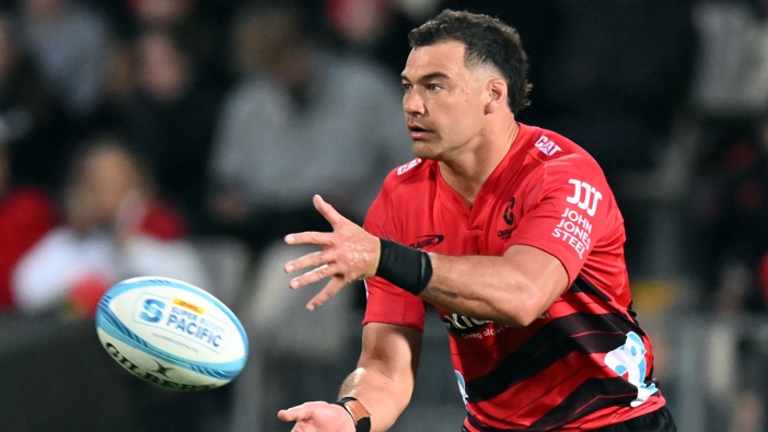 David Havili of the Crusaders passes the ball during the round 11 Super Rugby Pacific match between the Crusaders and Queensland Reds at Apollo Projects Stadium, on May 4, 2024, in Christchurch, New Zealand. (Photo by Kai Schwoerer/Getty Images)