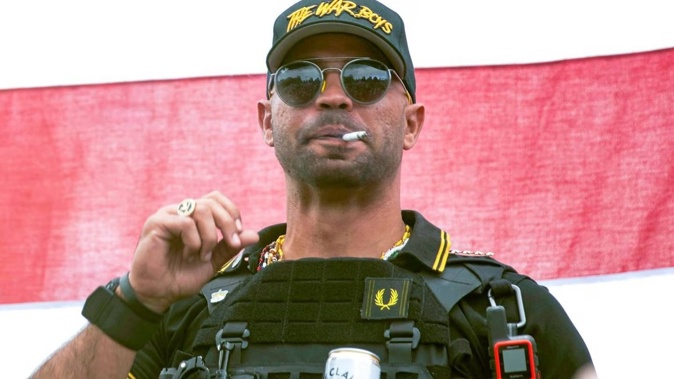 Proud Boys leader Henry 'Enrique' Tarrio wears a hat that says The War Boys during a rally in Portland. Photo / AP