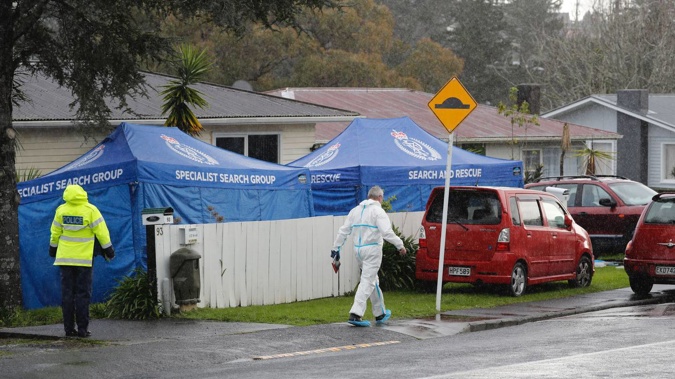 A scene examination taking place at the Glendene property after two people were found dead. Photo / Dean Purcell