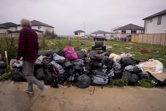 Illegal dumping in Elevation Street in Flat Bush has taken over the million dollar neighbourhood. Photo / Dean Purcell