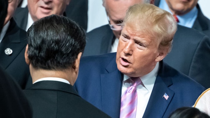 Chinese President Xi Jinping and President Donald Trump chat at the beginning of the G20 summit back in 2019. Photo / Getty Images