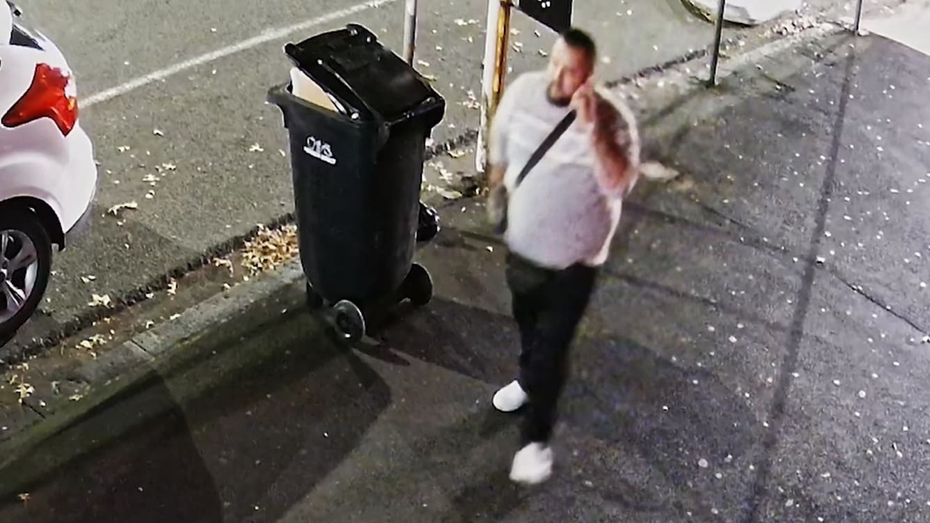 The man wanted by police in relation to the Ponsonby Rd shooting can be seen talking on his cellphone in the moments after the shooting.