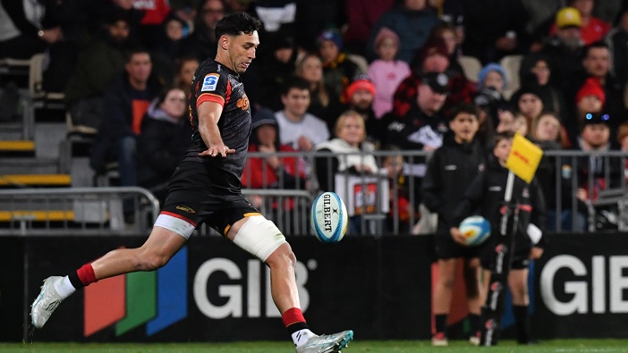 Shaun Stevenson of the Chiefs kicks the ball during the round 13 Super Rugby Pacific match between the Crusaders and the Chiefs at Apollo Projects Stadium in Christchurch, New Zealand, on May 10, 2025. (Photo by Sanka Vidanagama/NurPhoto via Getty Images)