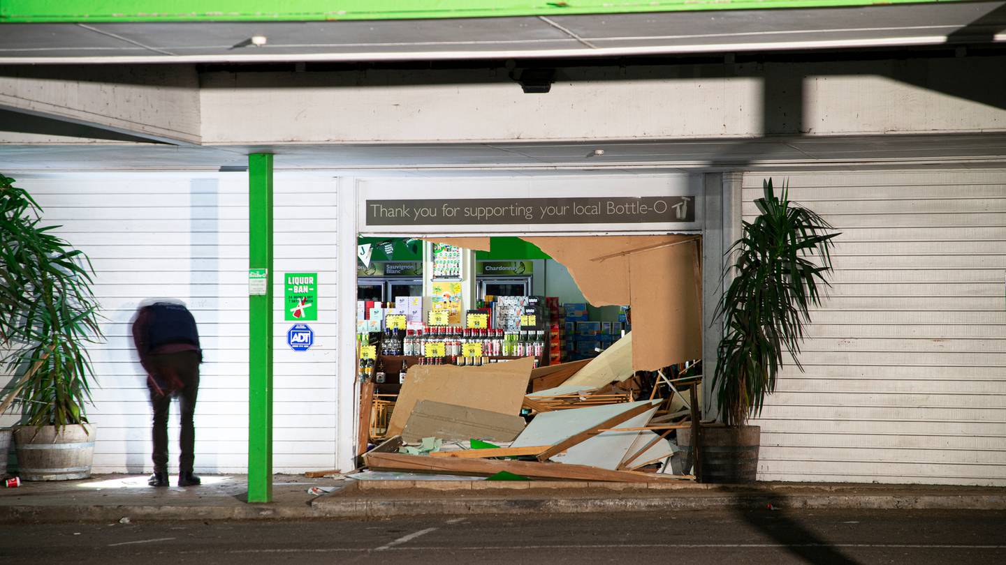 Four people have been arrested after a burglary at the Bottle-O Glenfield. Photo / Hayden Woodward