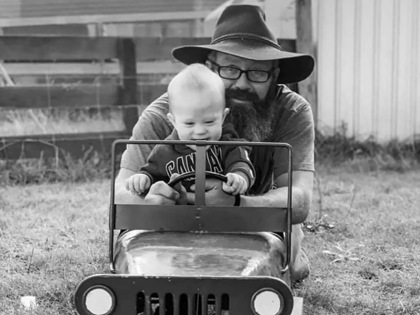 Brendan Miller with son Henry Miller. Brendan was found dead in his ute/utility vehicle after driving off the Omapere Bridge as the cyclone struck. Photo / Supplied