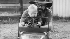 Brendan Miller with son Henry Miller. Brendan was found dead in his ute/utility vehicle after driving off the Omapere Bridge as the cyclone struck. Photo / Supplied