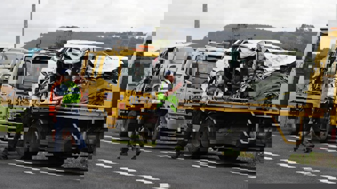 Emergency services responded to a fatal three-way car crash which claimed the life of an elderly woman on State Highway One, south of Whangārei, on Saturday. Photo / Michael Cunningham