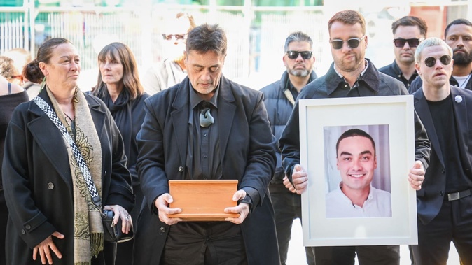 The inquest began on Monday into the death of Jordan Keil. Mum Debbie Thorpe (left) stands next to Jordan's dad, Mike Keil ,who is carrying his son's ashes. Photo / Michael Craig