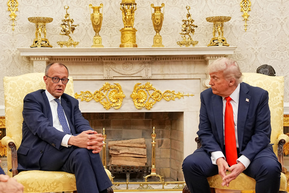05 June 2025, USA, Washington: US President Donald Trump (r) receives German Chancellor Friedrich Merz (CDU) in the Oval Office at the White House. It is the first meeting between the two politicians since Trump and Merz took office. Photo: Michael Kappeler/dpa (Photo by Michael Kappeler/picture alliance via Getty Images)