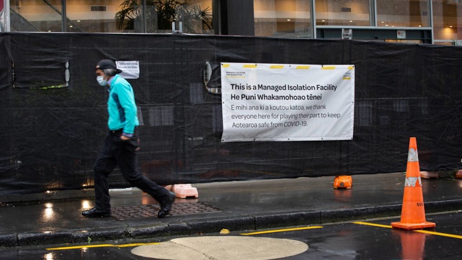 A man walks past the Rydges Hotel MIQ facility in Auckland. File photo / Sylvie Whinray
