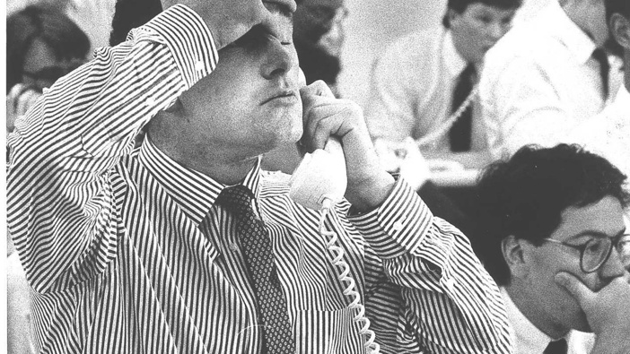 A sharebroker with O'Connor Grieve feels the strain of the frantic mornings trading at the Wellington Stock Exchange in October 1987. Photo / Paul Estcourt
