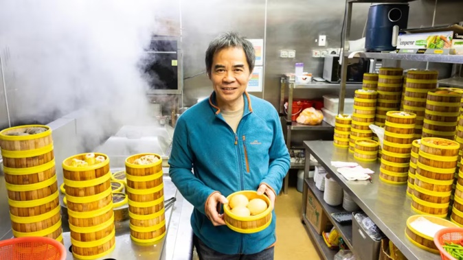 Zhuolun He, owner of Golden Rooster Chinese Restaurant, has a deep connection to Cantonese cuisine. Photo / RNZ, Yiting Lin