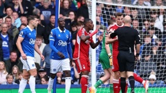 Nottingham Forest players, including All Whites striker Chris Wood, confront referee Anthony Taylor in their defeat at Everton. Photo / Getty Images