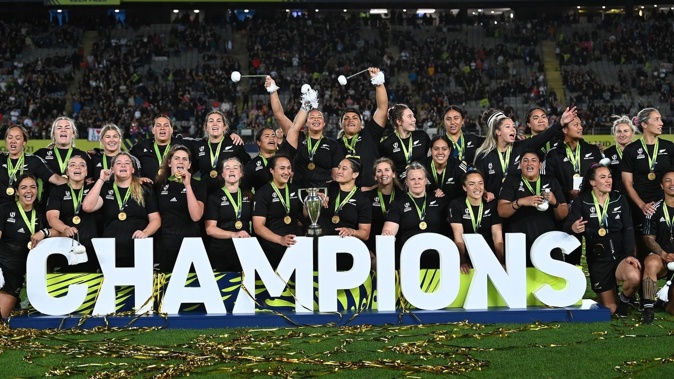 The Black Ferns celebrate with the trophy after winning the 2021 Women's Rugby World Cup final, played in 2022. Photo / Photosport