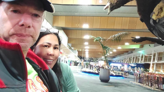 Marcus Pedersen and his wife Analynn Tano at Wellington Airport waiting for their $800 trip home. Photo / Supplied