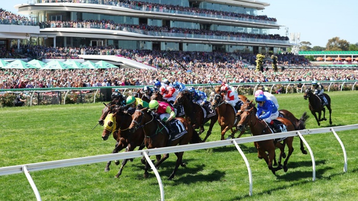 Robbie Dolan rides Knight's Choice beating Akira Sugawara riding Warp Speed to win Race 7, the Lexus Melbourne Cup during during Melbourne Cup Day at Flemington Racecourse on November 05, 2024 in Melbourne, Australia. (Photo by Daniel Pockett/Getty Images)