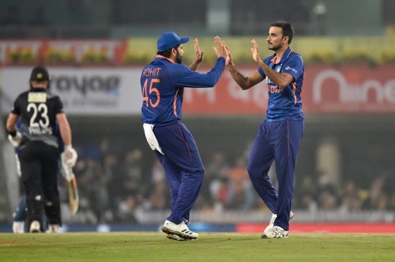 Harshal Patel of India celebrates the wicket of Glenn Phillips. (Photo / Getty)