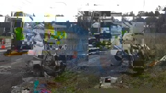 Firefighters had to remove the hatchback's roof and doors to free the driver. Photo / Peter de Graaf