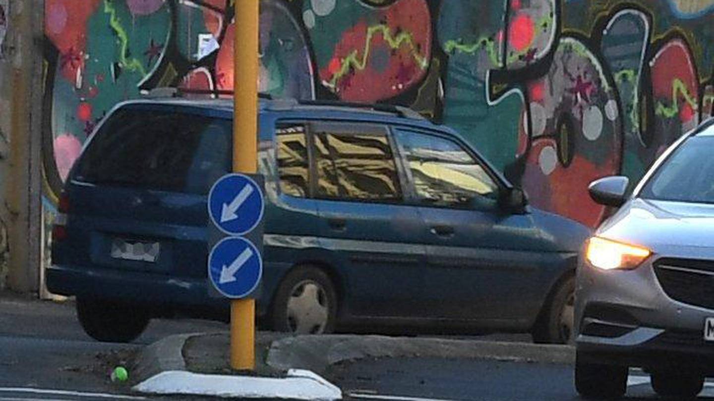 An allegedly stolen Mazda Demio being driven on lower Rattray St, in Dunedin, yesterday morning. Photo / Stephen Jaquiery, Otago Daily Times