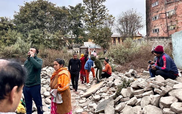 People gather in an open area following a major earthquake, in Kathmandu, on 7 January. Photo / AFP / Sunil Sharma