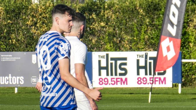Napier City Rovers forward Deri Corfe - giving his team-mates the thumbs up during their recent 3-1 Central League win over North Wellington - has been in stunning form this season. Photo / Neil Reid