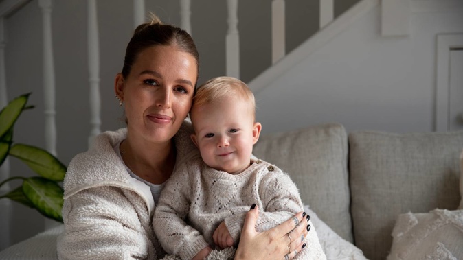 Samantha Glasswell with her 17-month-old son Bear Warburton at their home in West Auckland. Photo / Dean Purcell