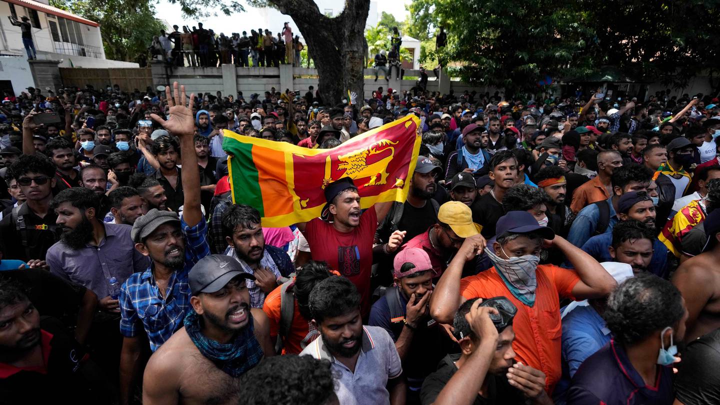 Sri Lankan protesters storm the compound of acting president Ranil Wickremesinghe's office, amid an economic crisis. Photo / AP