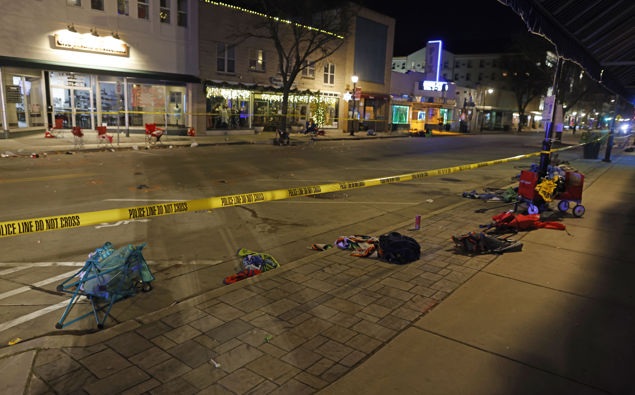 Police tape cordons off a street in Waukesha, Wis., after an SUV plowed into a Christmas parade hitting multiple people Sunday, Nov. 21, 2021. ( Photo / AP)