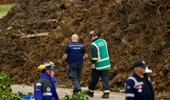 Emergency services at the Mount Maunganui Beachside Holiday Park during the search for missing people after a landslide. Photo / Jason Dorday
