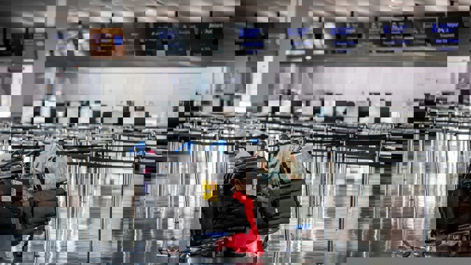 A lack of accommodation saw dozens of passengers sleep out in Auckland Airport. Photo / Michael Craig