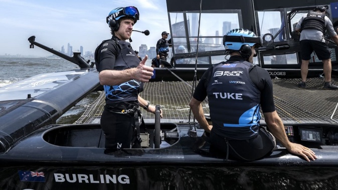 Peter Burling (left) and Blair Tuke during a Black Foils practice session in New York this week. Photo / SailGP