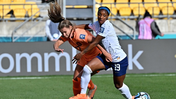 Victoria Pelova of the Netherlands and Crystal Dunn of the USA compete for the ball. Photo / Photosport