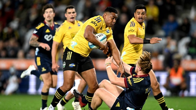 Julian Savea bumps off Scott Gregory's attempted tackle during a 2022 clash between the Hurricanes and Highlanders. Photo / Getty Images